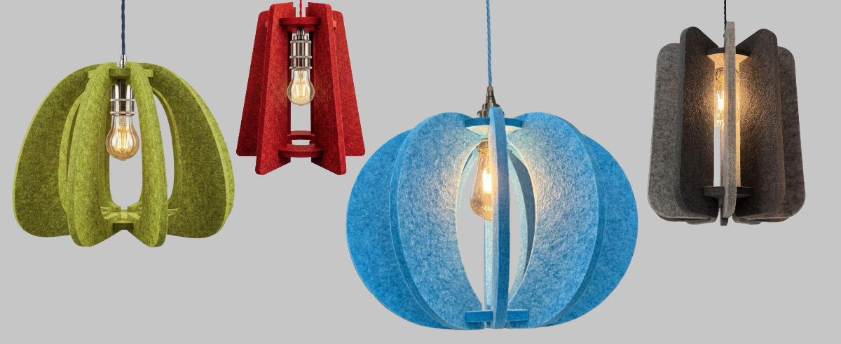 Four colorful pendant lights on a gray background