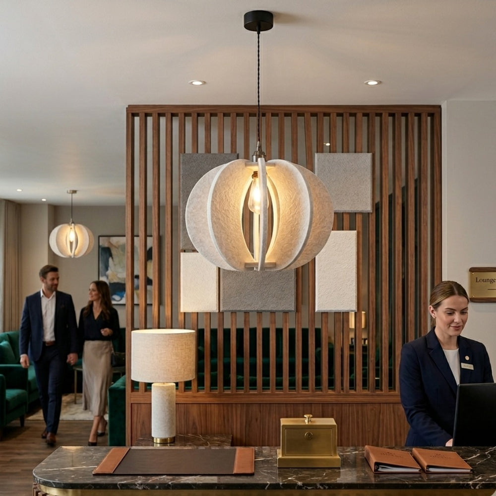 White acoustic pendant in a hotel lobby