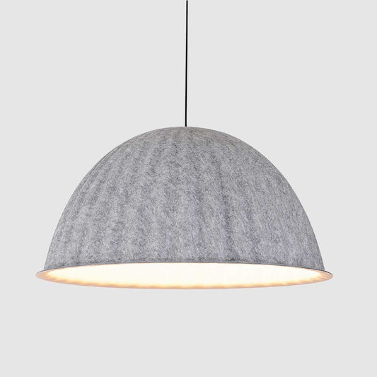 A lit ribbed felt acoustic grey ceiling fitting.